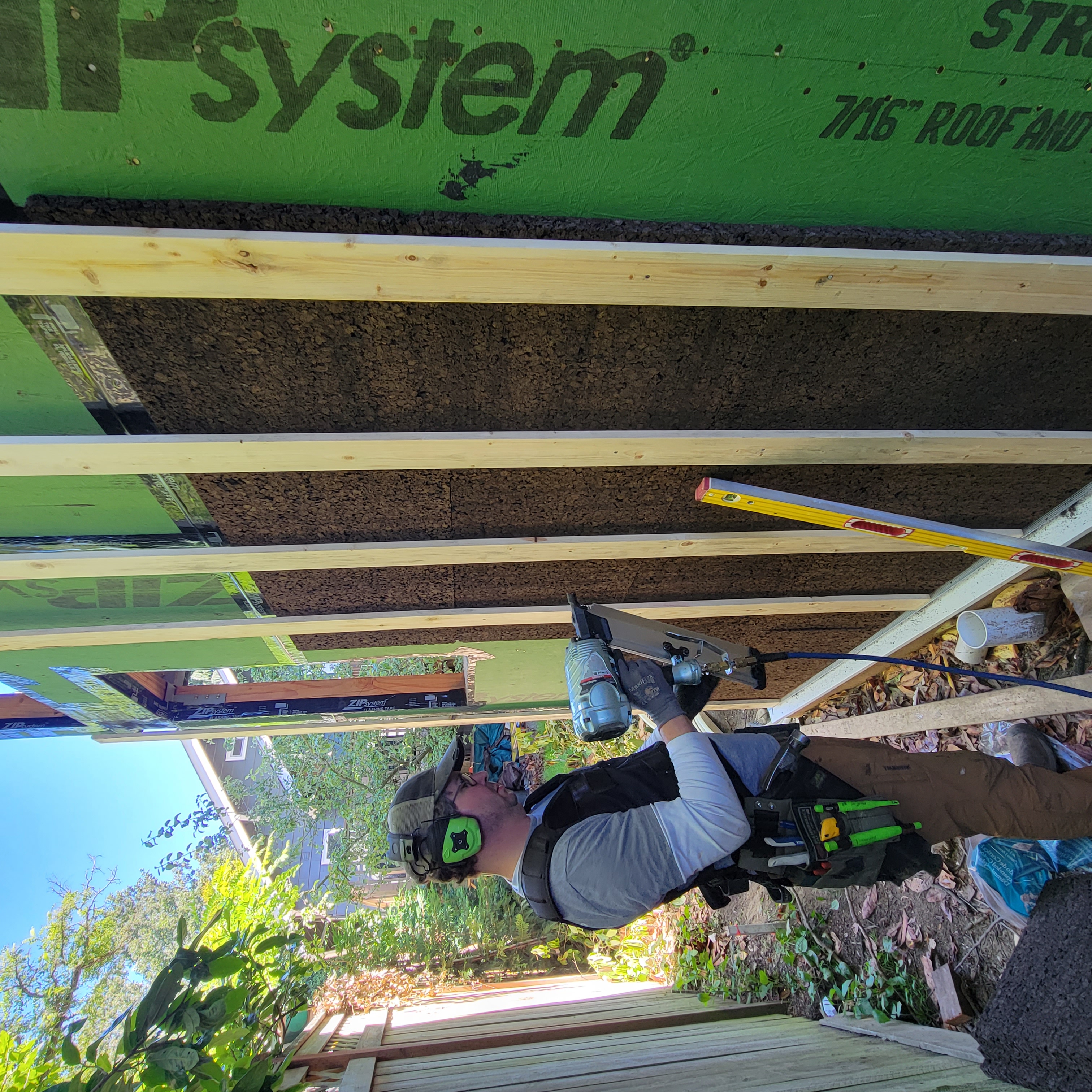 Installing the 1x4 rainscreen battens to hold the rigid cork board. Photo courtesy of Sean Conta.