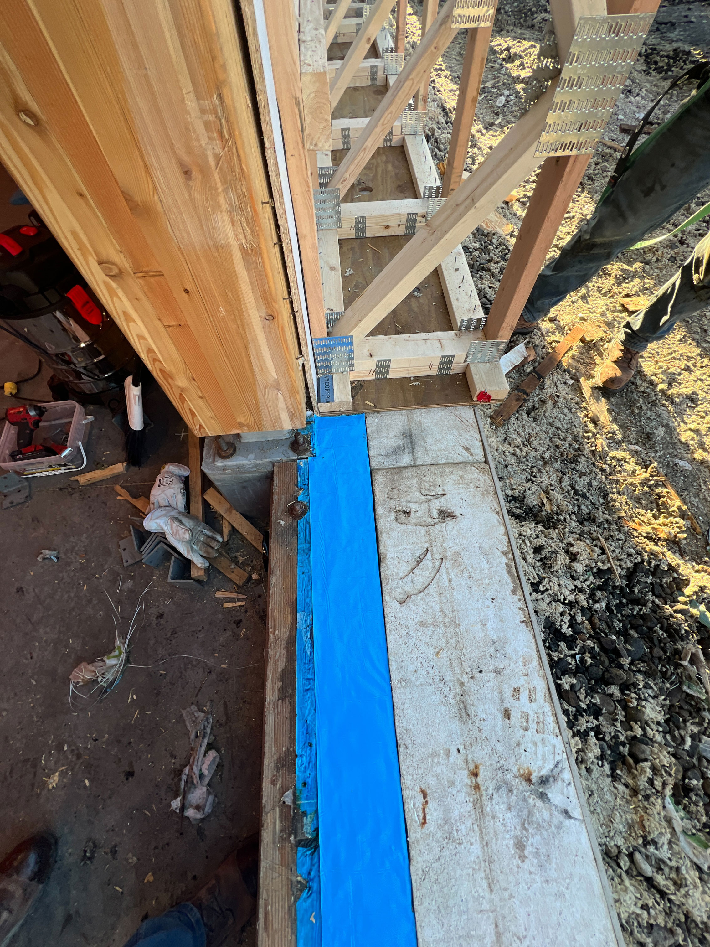 The mass timber column's detail at the foundation/wall transition and cross section of the open web truss that will hold the insulation.