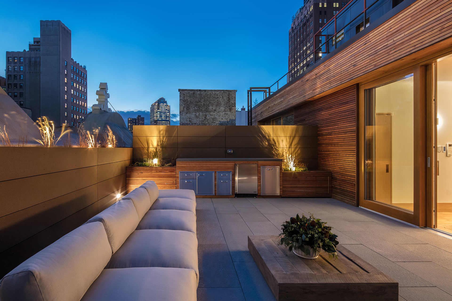 A balcony at 60 White Street in Manhattan outfitted with a sliding door by Zola.