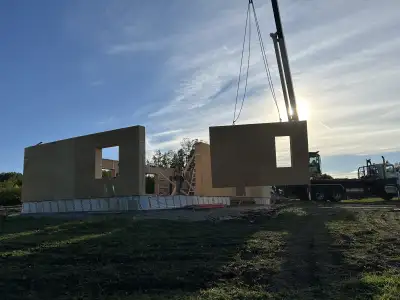 A Savick panel being lifted into place.
